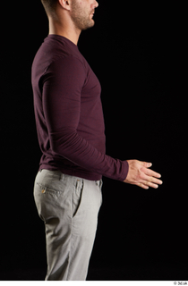 Anatoly  1 arm dressed flexing side view sweatshirt 0002.jpg